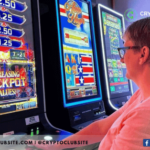 image of a man playing slot machine