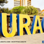 Image of a beach signage spelled Curacao