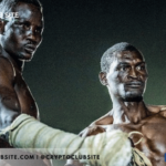 Image of 2 African men in a pre-fight faceoff